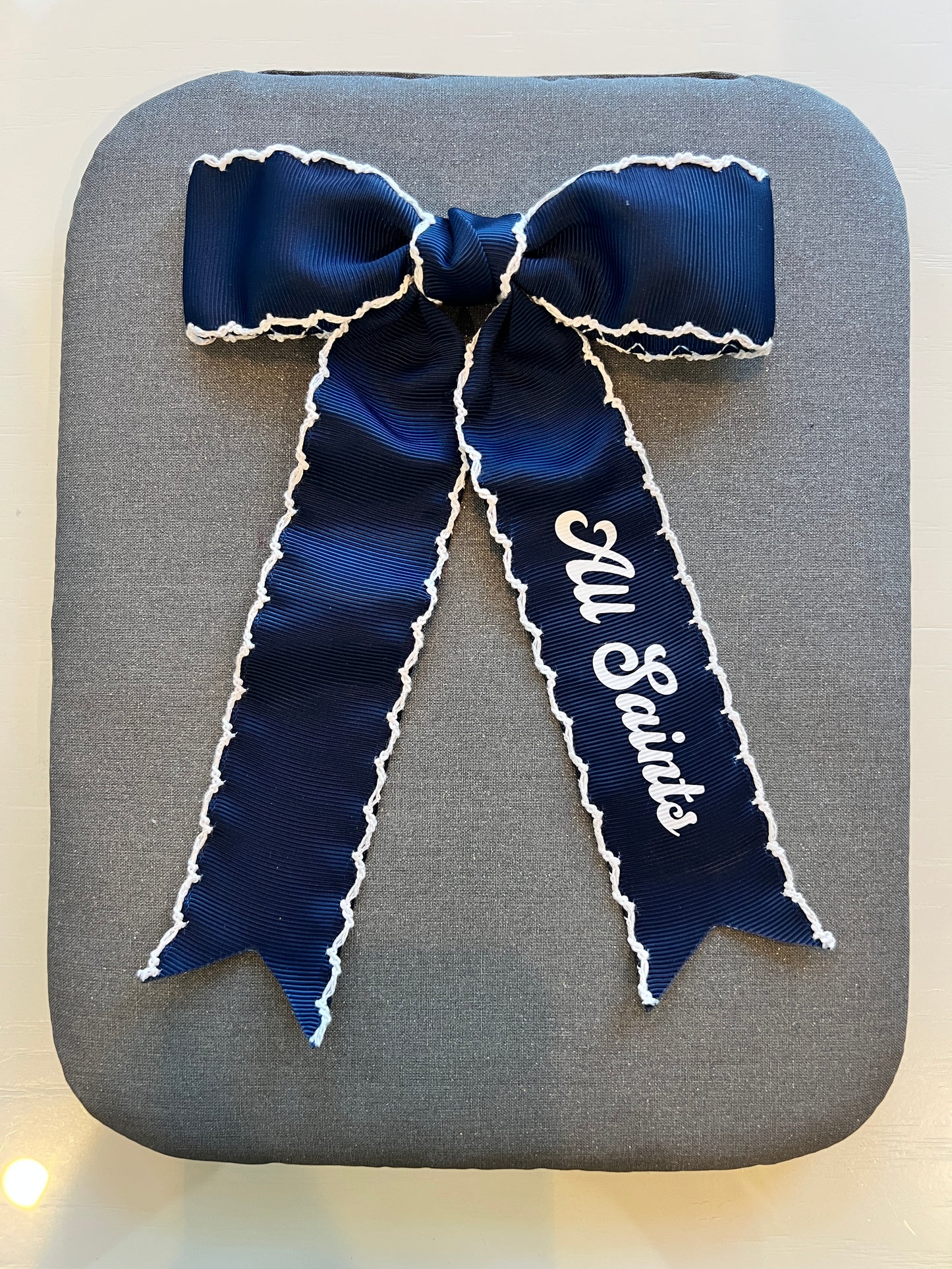 All Saints Clip Hair Bow with white trim